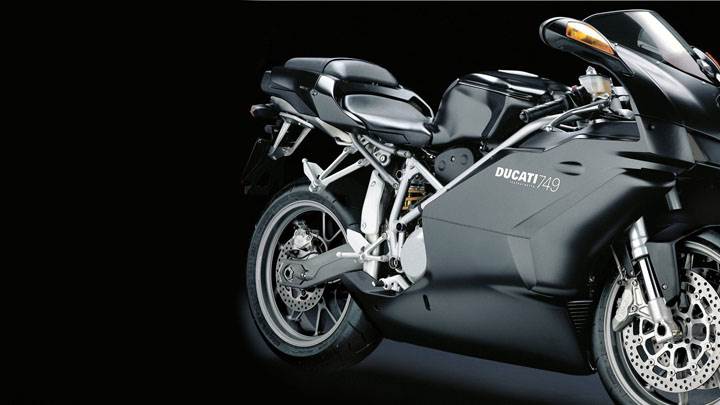 Ducati 749 2005 in Black Side Pose And Black Background